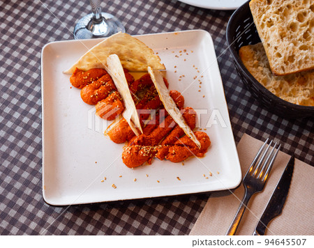 Muhamara - cream of hot pepper and walnut with Arabic bread 94645507