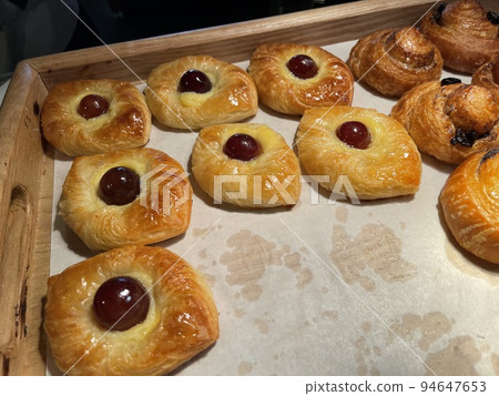freshly baked danish pastry with apricot jam fruity jelly super delicious warm fresh buttery baked pastries with apricot and peach 94647653