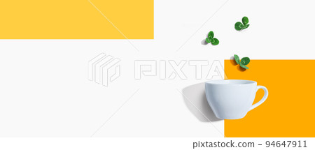 Shamrock leaves with coffee cup 94647911