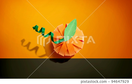 Paper craft autumn pumpkin overhead view 94647929