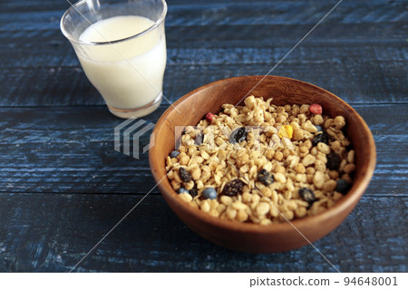 Fruit granola with kid's favorite dried fruits like corn flakes and cereal on the table 94648001