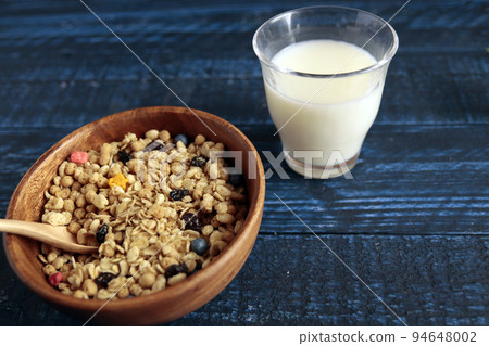 Fruit granola with kid's favorite dried fruits like corn flakes and cereal on the table 94648002