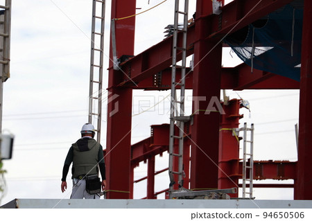 Worker at construction site Worker at construction site 94650506