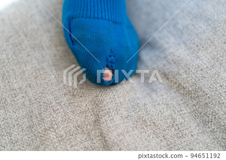 hole in sock 94651192
