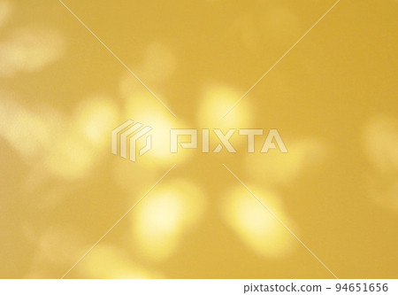 Abstract shadow of leaves on yellow background Abstract shadow of leaves on yellow background 94651656