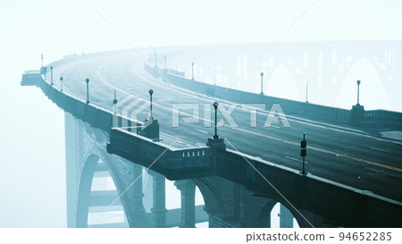 Old empty stone bridge on a foggy day 94652285