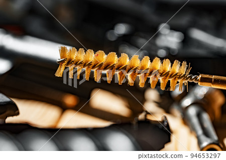 Ramrod for cleaning the barrels of weapons close up 94653297