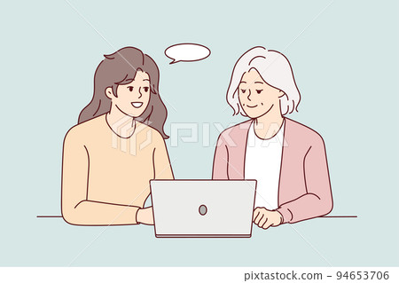 Smiling woman help mature mother with laptop  94653706