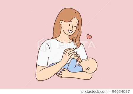 Happy woman feeding infant  94654027