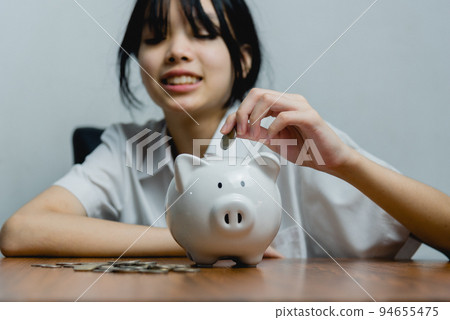child asian finance economic investment wealth pig currency money business banking, cash success saving girl holding coin piggy bank. child asian finance economic investment wealth pig currency money business banking, cash success saving girl holding coin piggy bank. 94655475