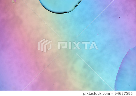 Defocused pastel colored abstract background picture made with oil, water and soap Defocused pastel colored abstract background picture made with oil, water and soap 94657595