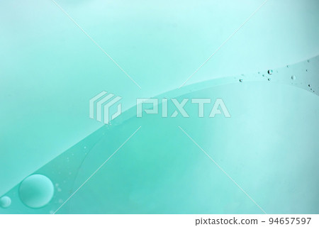 Light blue abstract background picture made with oil, water and soap Light blue abstract background picture made with oil, water and soap 94657597
