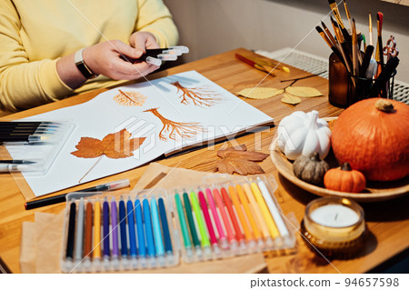 Art therapy for mental health recovery, Making Art Helps Improve Mental Health. Creativity and Recovery. Faceless portrait of woman drawing autumn trees with markers 94657598