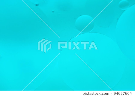Cyan blue abstract background picture made with oil, water and soap Cyan blue abstract background picture made with oil, water and soap 94657604