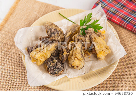Porcini fritters 94658720