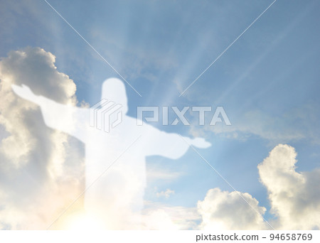 Ascension of Christ. Shining silhouette in the clouds Ascension of Christ. Shining silhouette in the clouds 94658769
