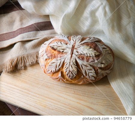 Tasty soft bread on the board 94658779