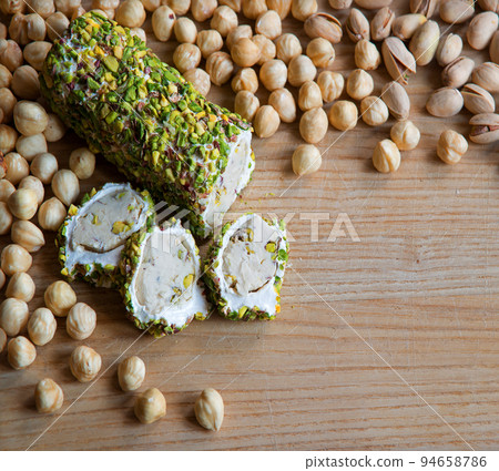 Nuts and halva on the table 94658786