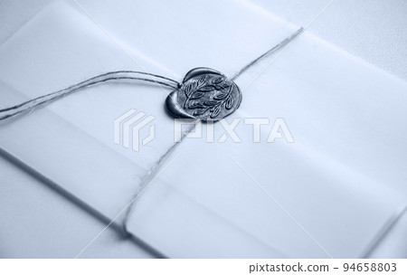 White envelope with a seal. Light background White envelope with a seal. Light background 94658803