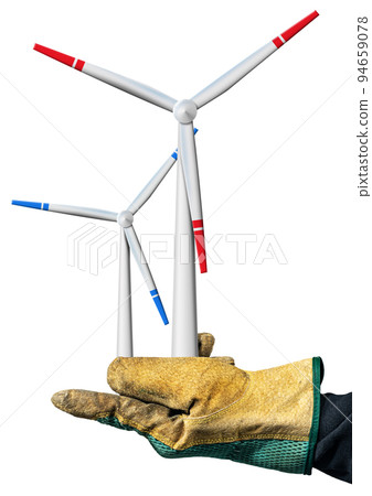 Gloved Hand Holding two Wind Turbines Isolated on White Background 94659078