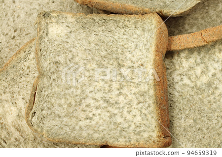 Moldy bread texture background, ideas of inedible food and expired. Moldy bread texture background, ideas of inedible food and expired. 94659319