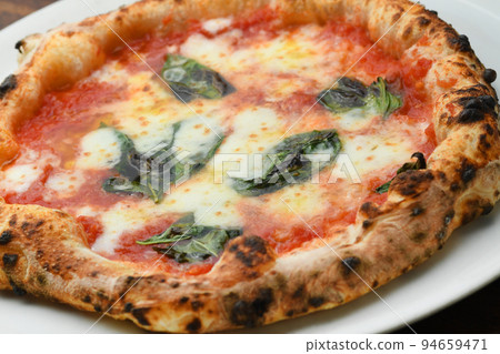 Freshly Baked Pizza Margherita Italian Freshly Baked Pizza Margherita Italian 94659471