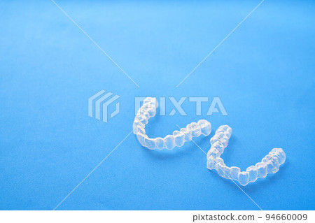 clear invisible aligners or braces used in orthodontics clear invisible aligners or braces used in orthodontics 94660009