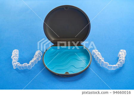 A transparent, invisible aligner or brace used in orthodontics and its container A transparent, invisible aligner or brace used in orthodontics and its container 94660016