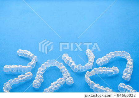 clear invisible aligners or braces used in orthodontics clear invisible aligners or braces used in orthodontics 94660028