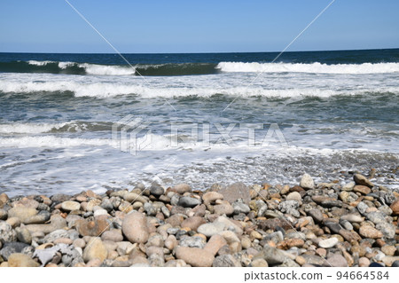 sea coast wave scenery nature blue sky sandy beach 94664584