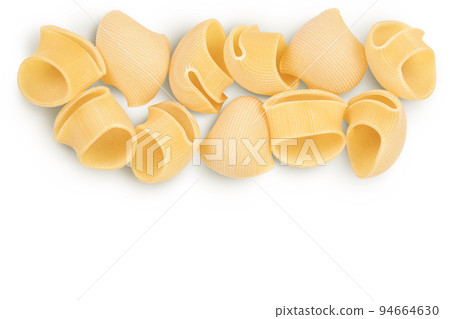 lumaconi pasta isolated on white background with full depth of field. Top view with copy space for your text. Flat lay lumaconi pasta isolated on white background with full depth of field. Top view with copy space for your text. Flat lay 94664630