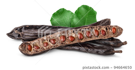 Ripe carob pods and bean isolated on white background with full depth of field Ripe carob pods and bean isolated on white background with full depth of field 94664650