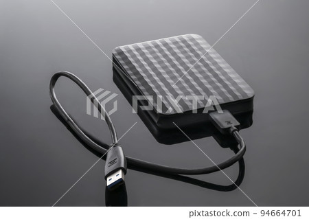 external hard disk drive memory for computer on a black background close-up 94664701