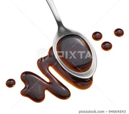 Balsamic sauce in spoon isolated on white background, top view 94664843