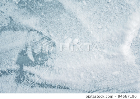 cold winter background with icy frozen texture 94667196