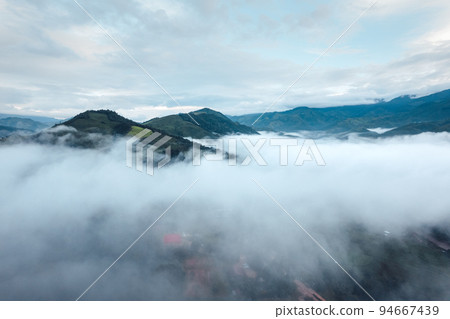 fog and mountains in the morning 94667439