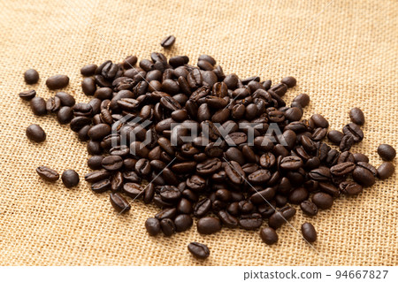 coffee beans on a jute bag 94667827