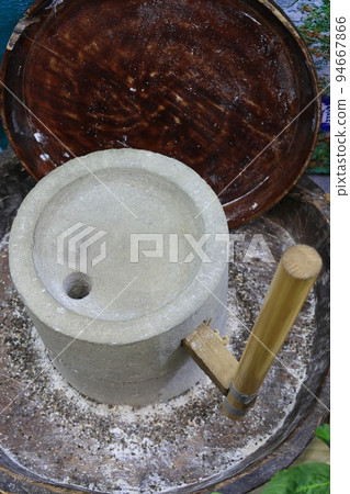 Stone mortar for grinding buckwheat seeds 94667866