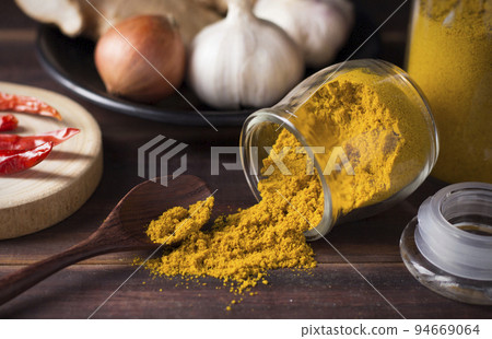 Heap of curry powder 94669064