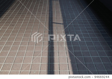 23 Sept 2022 rays of the sun gently lie on the road of stones 94669244