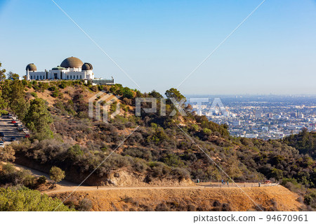 Sunny view of the Los Angeles cityscape with Griffith Observatory Sunny view of the Los Angeles cityscape with Griffith Observatory 94670961