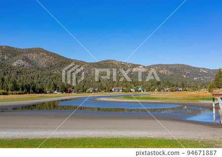 Sunny view of the landscape in Big bear lake Sunny view of the landscape in Big bear lake 94671887