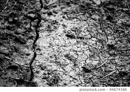 Trench in soil from knife injecting manure fertilizer in the fall. Trench in soil from knife injecting manure fertilizer in the fall. 94674386