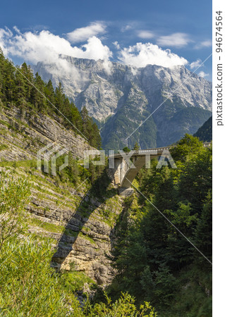 Mountain road to Mangart, Ttriglav national park, Slovenia Mountain road to Mangart, Ttriglav national park, Slovenia 94674564