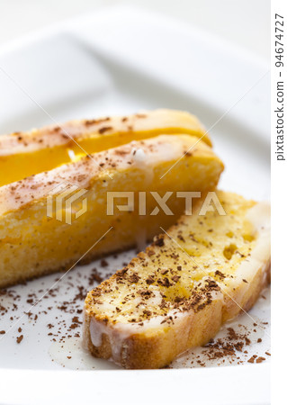 homemade lemon cake with chocolate topping 94674727