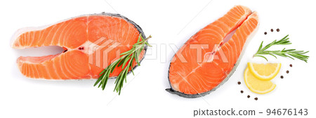 Slice of red fish salmon with lemon, rosemary and peppercorns isolated on white background. Top view. Flat lay Slice of red fish salmon with lemon, rosemary and peppercorns isolated on white background. Top view. Flat lay 94676143