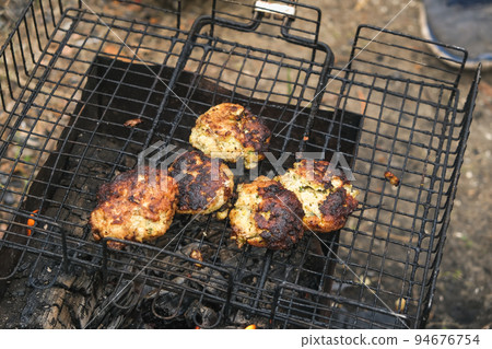 Cooking shish kebab on the grill. Cooking 94676754