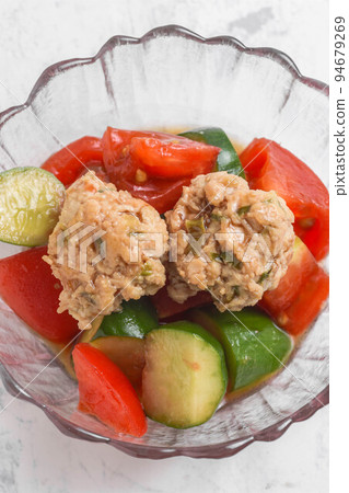 Marinated summer vegetables and meatballs 94679269