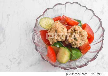 Marinated summer vegetables and meatballs 94679430