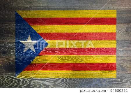Catalonia independence flag on rustic old wood surface background Catalonia independence flag on rustic old wood surface background 94680251